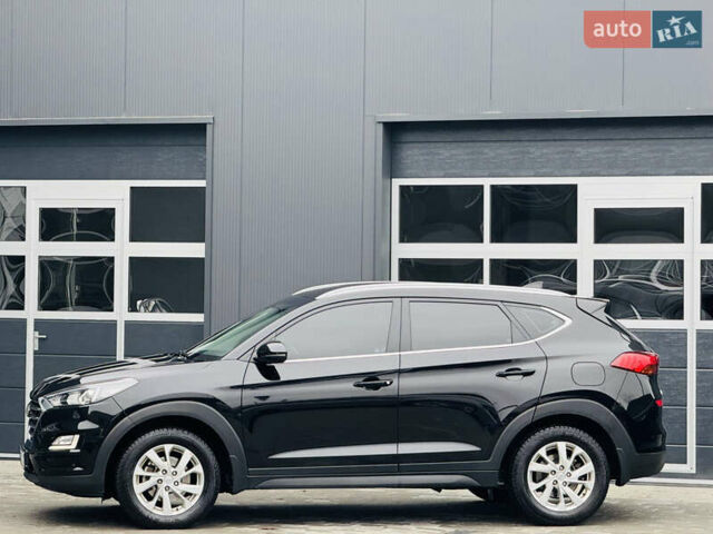 Чорний Хендай Туксон, об'ємом двигуна 2 л та пробігом 84 тис. км за 19000 $, фото 7 на Automoto.ua