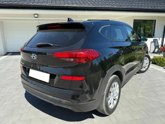 Черный Хендай Туксон, объемом двигателя 2 л и пробегом 80 тыс. км за 9500 $, фото 6 на Automoto.ua