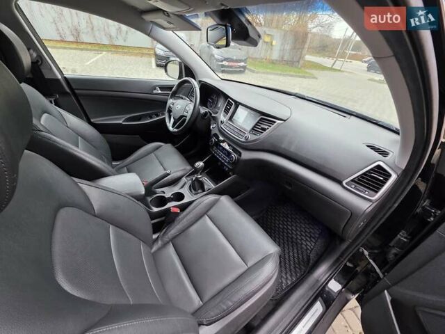 Черный Хендай Туксон, объемом двигателя 2 л и пробегом 151 тыс. км за 18950 $, фото 47 на Automoto.ua