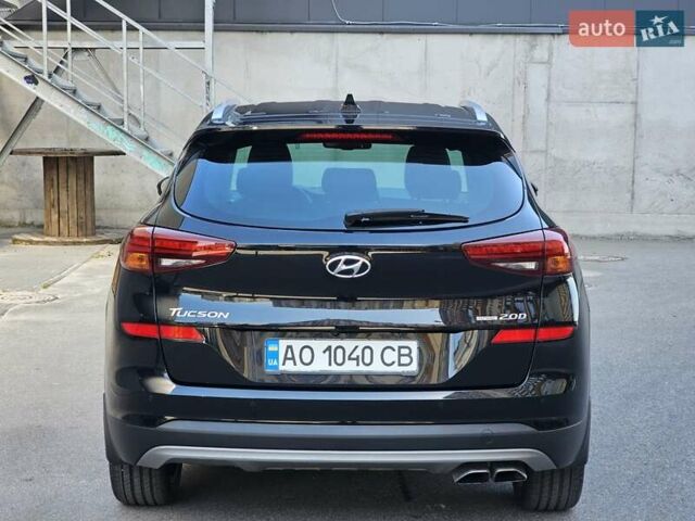 Черный Хендай Туксон, объемом двигателя 2 л и пробегом 108 тыс. км за 25500 $, фото 3 на Automoto.ua