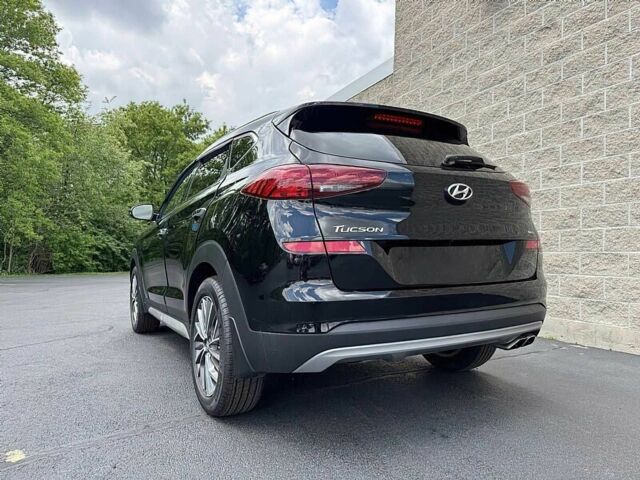 Черный Хендай Туксон, объемом двигателя 2.4 л и пробегом 42 тыс. км за 4100 $, фото 4 на Automoto.ua