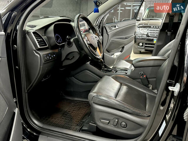 Черный Хендай Туксон, объемом двигателя 2 л и пробегом 153 тыс. км за 20500 $, фото 13 на Automoto.ua