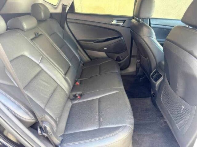 Чорний Хендай Туксон, об'ємом двигуна 2.4 л та пробігом 89 тис. км за 9800 $, фото 15 на Automoto.ua