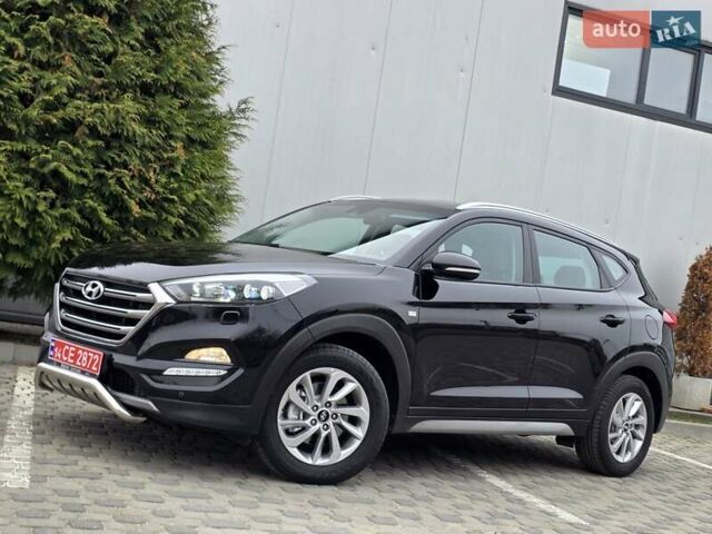 Черный Хендай Туксон, объемом двигателя 2 л и пробегом 151 тыс. км за 18950 $, фото 7 на Automoto.ua