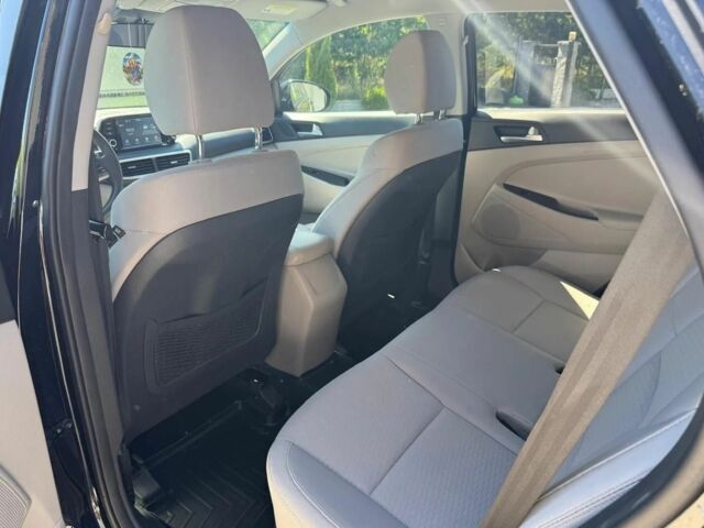 Черный Хендай Туксон, объемом двигателя 2 л и пробегом 80 тыс. км за 9500 $, фото 16 на Automoto.ua