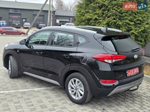 Черный Хендай Туксон, объемом двигателя 2 л и пробегом 151 тыс. км за 18950 $, фото 35 на Automoto.ua