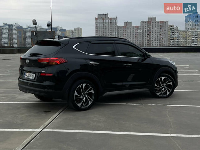 Чорний Хендай Туксон, об'ємом двигуна 2 л та пробігом 145 тис. км за 23900 $, фото 10 на Automoto.ua