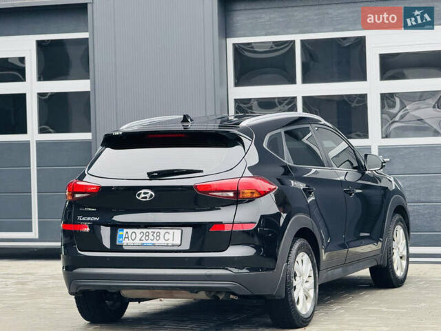 Чорний Хендай Туксон, об'ємом двигуна 2 л та пробігом 84 тис. км за 19000 $, фото 14 на Automoto.ua