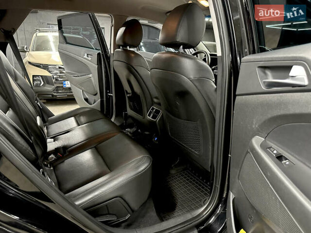 Черный Хендай Туксон, объемом двигателя 2 л и пробегом 153 тыс. км за 20500 $, фото 19 на Automoto.ua