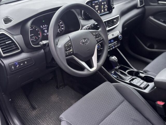 Черный Хендай Туксон, объемом двигателя 2.4 л и пробегом 140 тыс. км за 20000 $, фото 6 на Automoto.ua