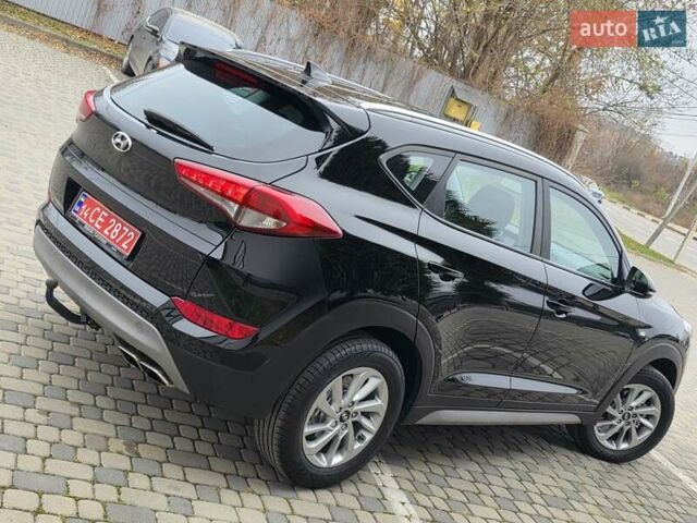 Черный Хендай Туксон, объемом двигателя 2 л и пробегом 151 тыс. км за 18950 $, фото 32 на Automoto.ua
