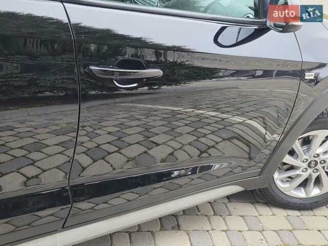 Черный Хендай Туксон, объемом двигателя 2 л и пробегом 151 тыс. км за 18950 $, фото 36 на Automoto.ua