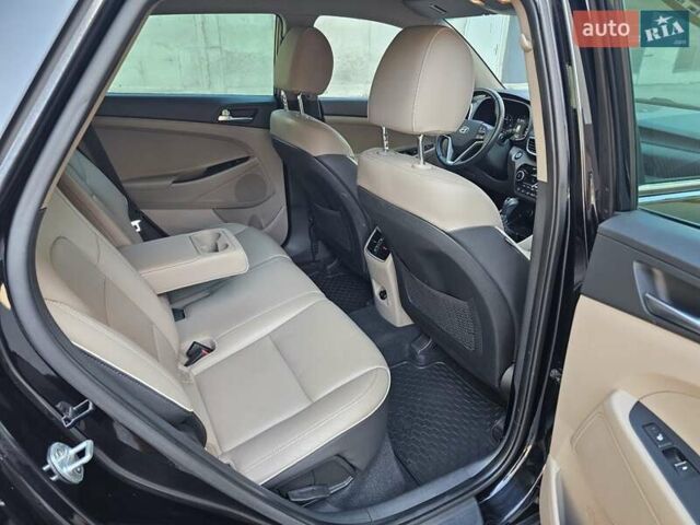 Черный Хендай Туксон, объемом двигателя 2 л и пробегом 108 тыс. км за 25500 $, фото 58 на Automoto.ua