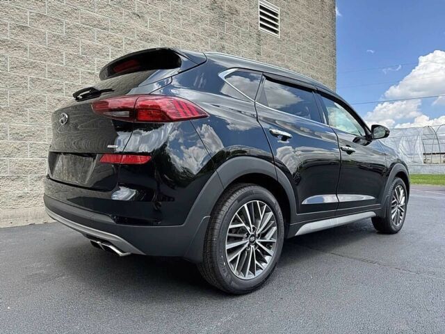 Черный Хендай Туксон, объемом двигателя 2.4 л и пробегом 42 тыс. км за 4100 $, фото 3 на Automoto.ua