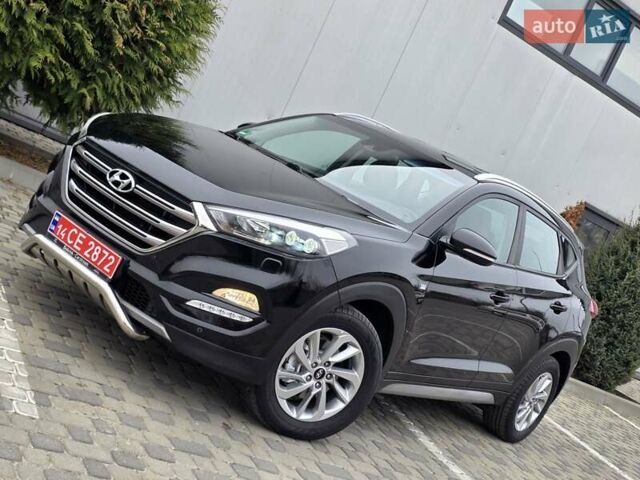 Черный Хендай Туксон, объемом двигателя 2 л и пробегом 151 тыс. км за 18950 $, фото 5 на Automoto.ua