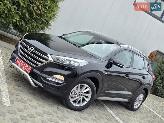 Черный Хендай Туксон, объемом двигателя 2 л и пробегом 151 тыс. км за 18950 $, фото 8 на Automoto.ua