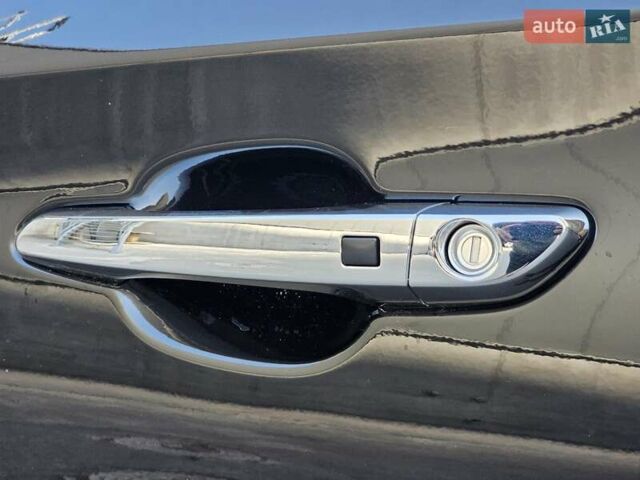 Черный Хендай Туксон, объемом двигателя 2 л и пробегом 108 тыс. км за 25500 $, фото 14 на Automoto.ua