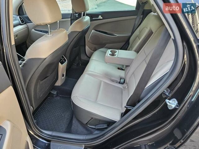 Черный Хендай Туксон, объемом двигателя 2 л и пробегом 108 тыс. км за 25500 $, фото 61 на Automoto.ua