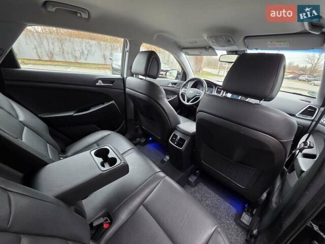 Черный Хендай Туксон, объемом двигателя 2 л и пробегом 151 тыс. км за 18950 $, фото 58 на Automoto.ua