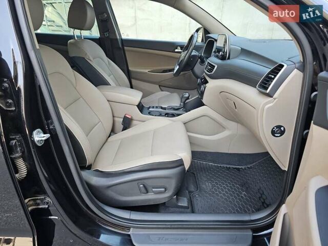 Черный Хендай Туксон, объемом двигателя 2 л и пробегом 108 тыс. км за 25500 $, фото 52 на Automoto.ua