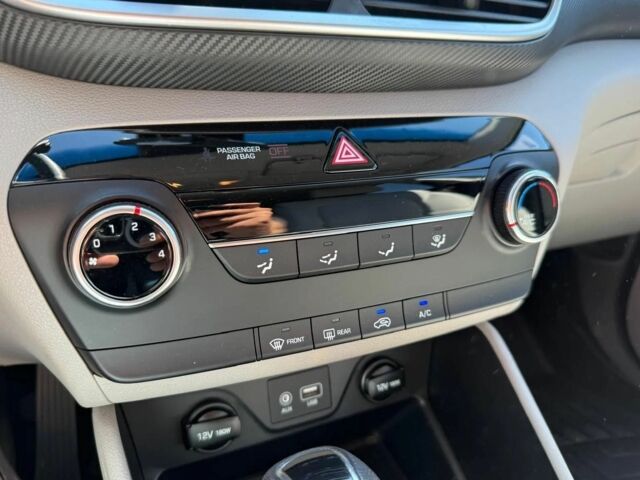 Черный Хендай Туксон, объемом двигателя 2 л и пробегом 80 тыс. км за 9500 $, фото 13 на Automoto.ua