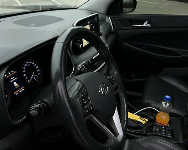 Чорний Хендай Туксон, об'ємом двигуна 2 л та пробігом 145 тис. км за 23900 $, фото 26 на Automoto.ua