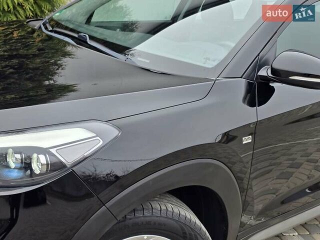 Черный Хендай Туксон, объемом двигателя 2 л и пробегом 151 тыс. км за 18950 $, фото 13 на Automoto.ua