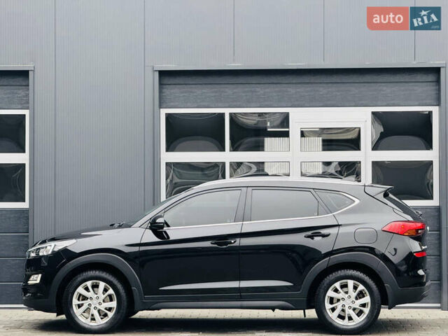 Чорний Хендай Туксон, об'ємом двигуна 2 л та пробігом 84 тис. км за 19000 $, фото 8 на Automoto.ua