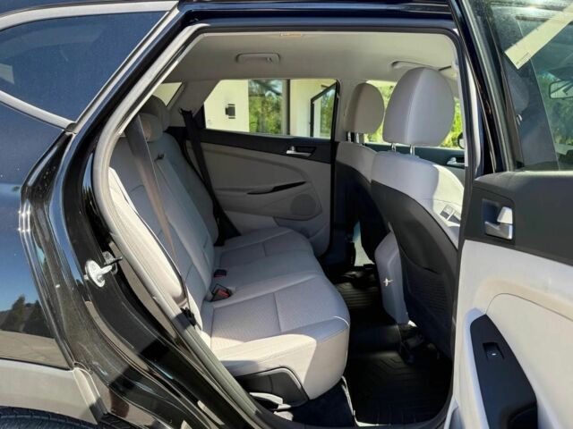 Черный Хендай Туксон, объемом двигателя 2 л и пробегом 80 тыс. км за 9500 $, фото 17 на Automoto.ua