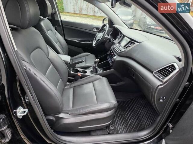 Черный Хендай Туксон, объемом двигателя 2 л и пробегом 151 тыс. км за 18950 $, фото 45 на Automoto.ua