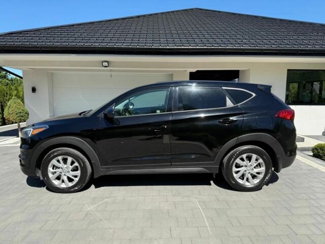 Черный Хендай Туксон, объемом двигателя 2 л и пробегом 80 тыс. км за 9500 $, фото 2 на Automoto.ua