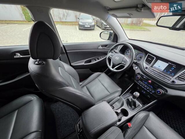 Черный Хендай Туксон, объемом двигателя 2 л и пробегом 151 тыс. км за 18950 $, фото 61 на Automoto.ua