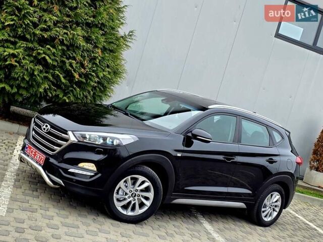 Черный Хендай Туксон, объемом двигателя 2 л и пробегом 151 тыс. км за 18950 $, фото 4 на Automoto.ua