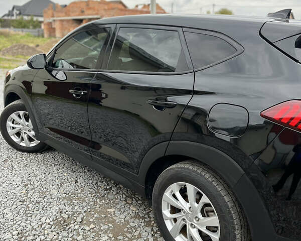 Черный Хендай Туксон, объемом двигателя 2 л и пробегом 192 тыс. км за 15200 $, фото 13 на Automoto.ua