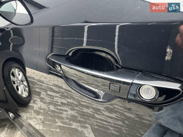 Чорний Хендай Туксон, об'ємом двигуна 2 л та пробігом 84 тис. км за 19000 $, фото 37 на Automoto.ua