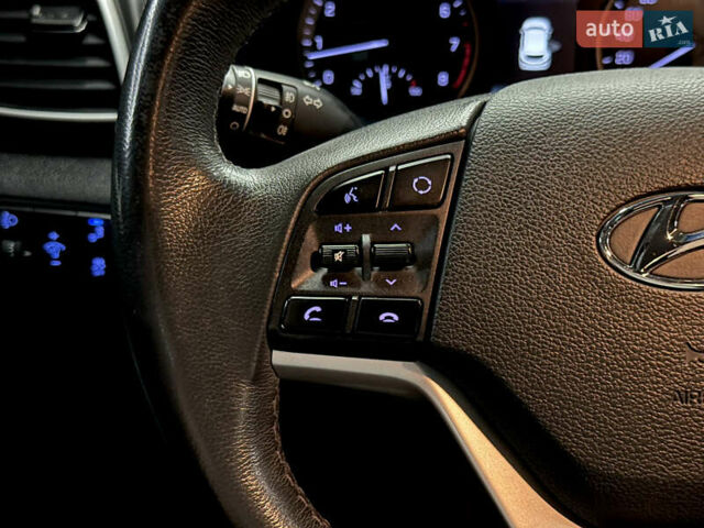 Черный Хендай Туксон, объемом двигателя 2 л и пробегом 153 тыс. км за 20500 $, фото 28 на Automoto.ua