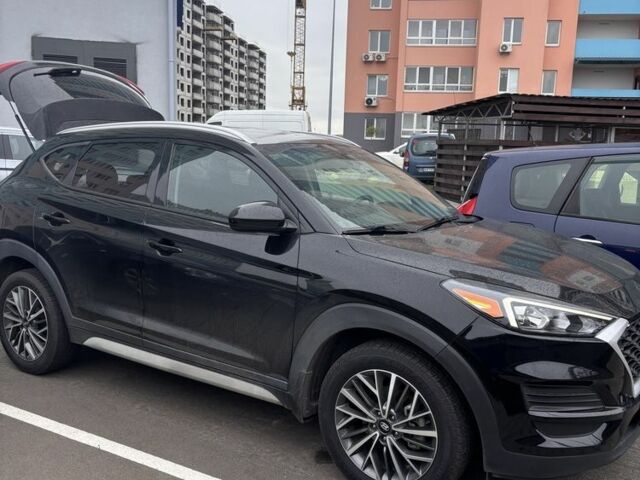 Черный Хендай Туксон, объемом двигателя 2.4 л и пробегом 140 тыс. км за 20000 $, фото 1 на Automoto.ua