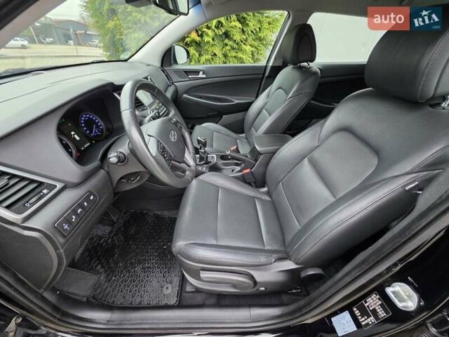 Черный Хендай Туксон, объемом двигателя 2 л и пробегом 151 тыс. км за 18950 $, фото 80 на Automoto.ua