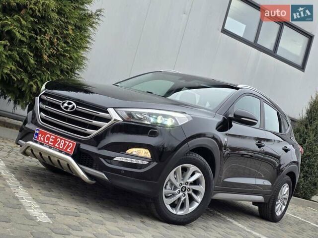 Черный Хендай Туксон, объемом двигателя 2 л и пробегом 151 тыс. км за 18950 $, фото 11 на Automoto.ua
