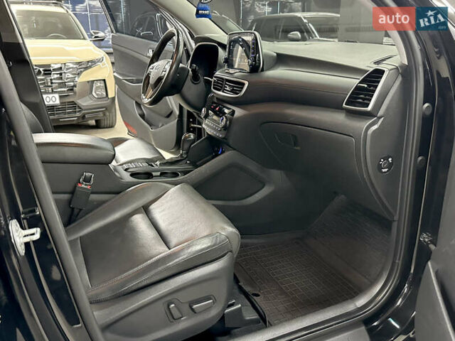 Черный Хендай Туксон, объемом двигателя 2 л и пробегом 153 тыс. км за 20500 $, фото 11 на Automoto.ua