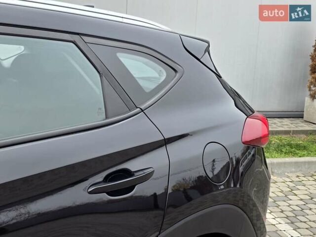 Черный Хендай Туксон, объемом двигателя 2 л и пробегом 151 тыс. км за 18950 $, фото 26 на Automoto.ua