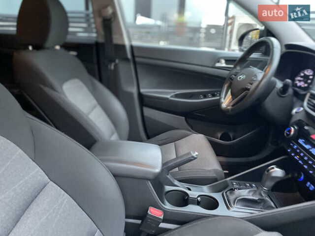 Черный Хендай Туксон, объемом двигателя 2 л и пробегом 103 тыс. км за 20900 $, фото 42 на Automoto.ua