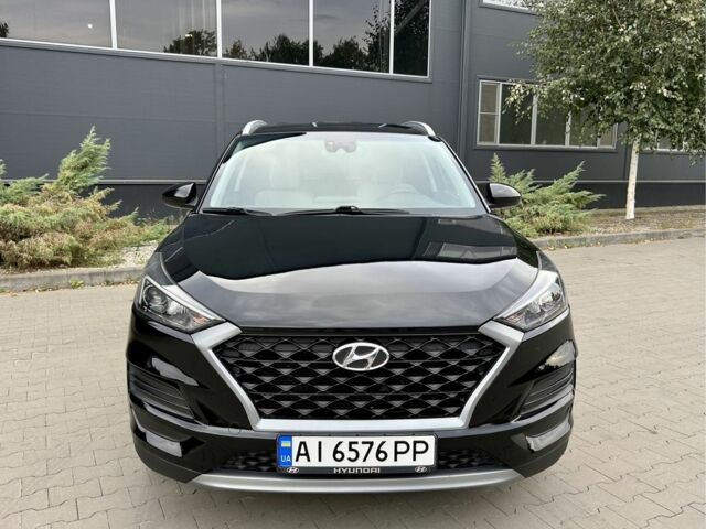 Черный Хендай Туксон, объемом двигателя 2.4 л и пробегом 147 тыс. км за 16400 $, фото 2 на Automoto.ua