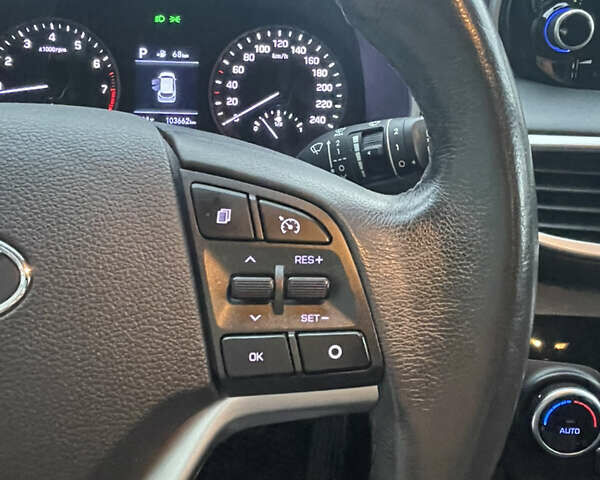 Черный Хендай Туксон, объемом двигателя 2 л и пробегом 103 тыс. км за 20900 $, фото 27 на Automoto.ua