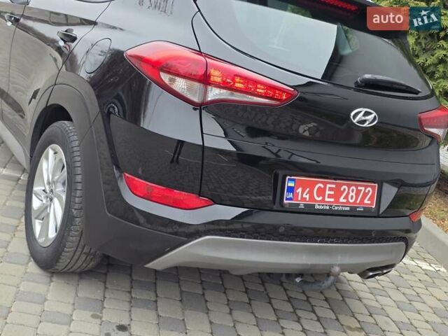 Черный Хендай Туксон, объемом двигателя 2 л и пробегом 151 тыс. км за 18950 $, фото 30 на Automoto.ua