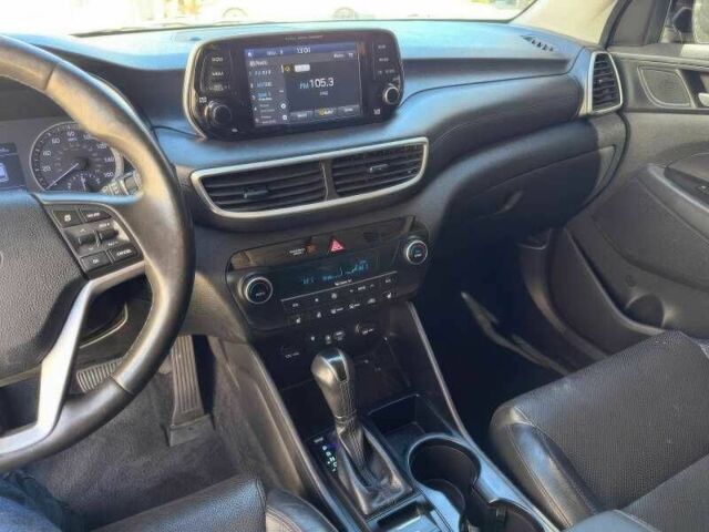 Чорний Хендай Туксон, об'ємом двигуна 2.4 л та пробігом 89 тис. км за 9800 $, фото 12 на Automoto.ua