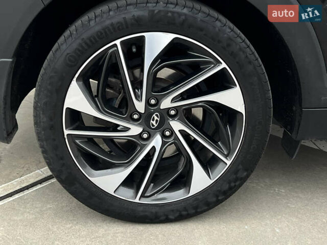 Чорний Хендай Туксон, об'ємом двигуна 2 л та пробігом 145 тис. км за 23900 $, фото 11 на Automoto.ua