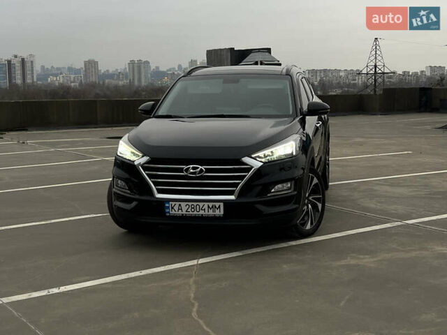 Чорний Хендай Туксон, об'ємом двигуна 2 л та пробігом 145 тис. км за 23900 $, фото 1 на Automoto.ua