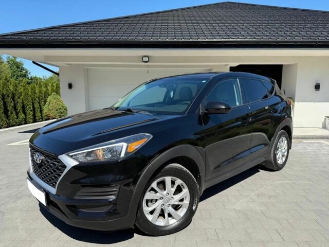 Черный Хендай Туксон, объемом двигателя 2 л и пробегом 80 тыс. км за 9500 $, фото 1 на Automoto.ua