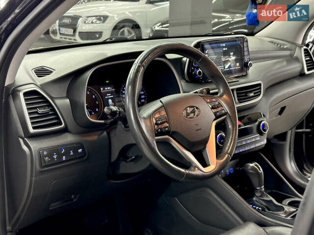 Черный Хендай Туксон, объемом двигателя 2 л и пробегом 153 тыс. км за 20500 $, фото 15 на Automoto.ua